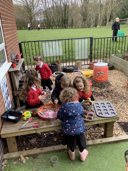 Image of Fun in the mud kitchen! 